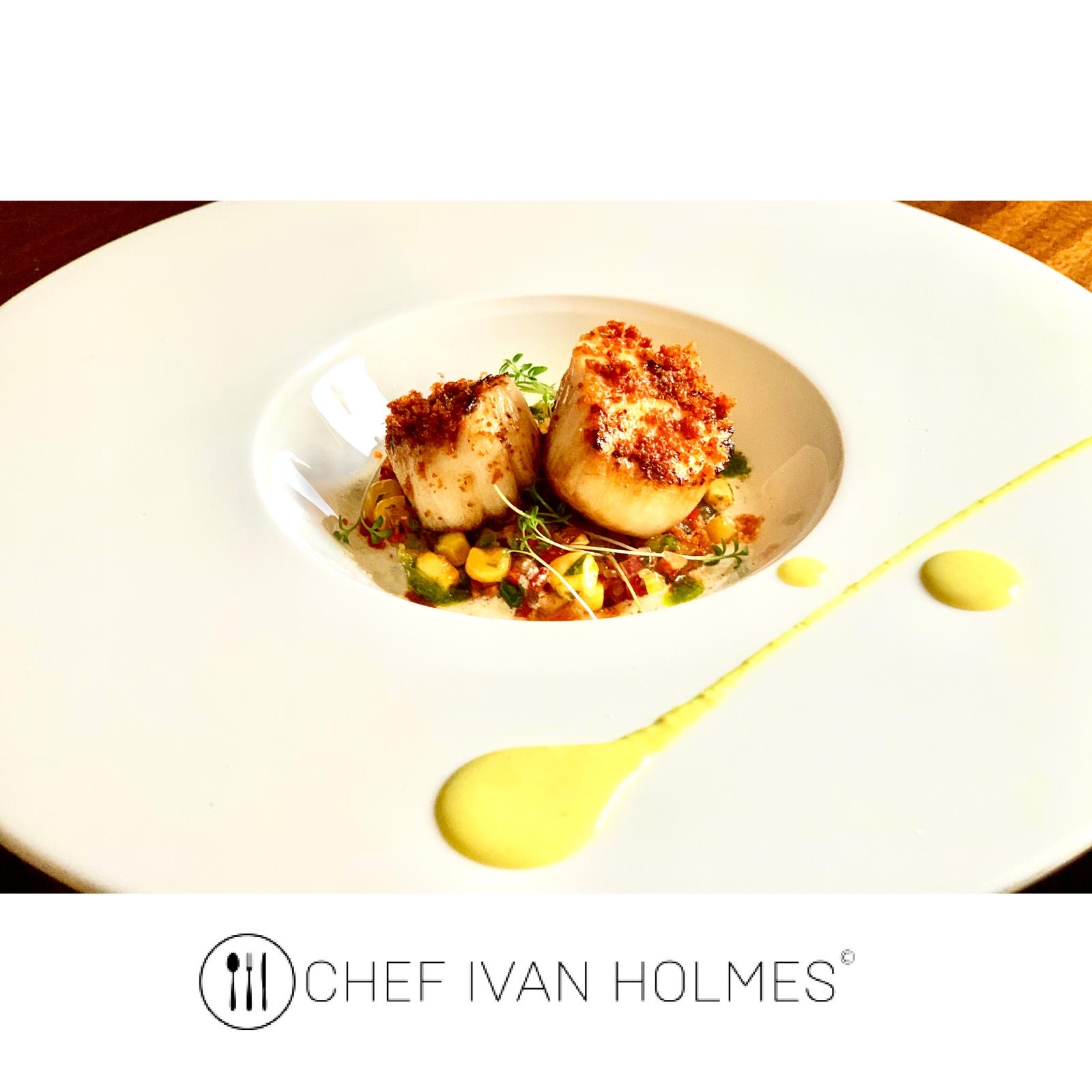 Seared scallops with a crisp crumb, sweetcorn and saffron sauce